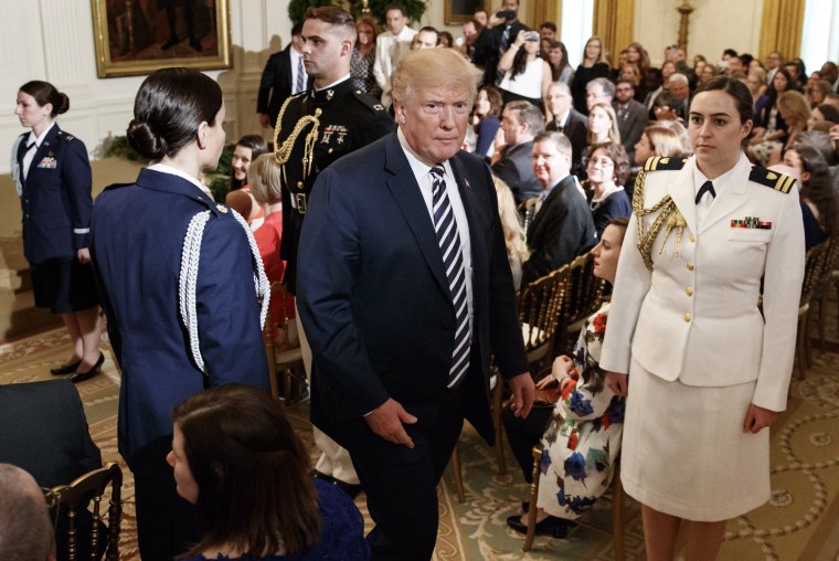Image: Trump walks from the East Room after presenting the National Teacher of the Year award