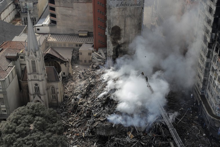 Image: At least one dead in collapse of a burnt building in Sao Paulo