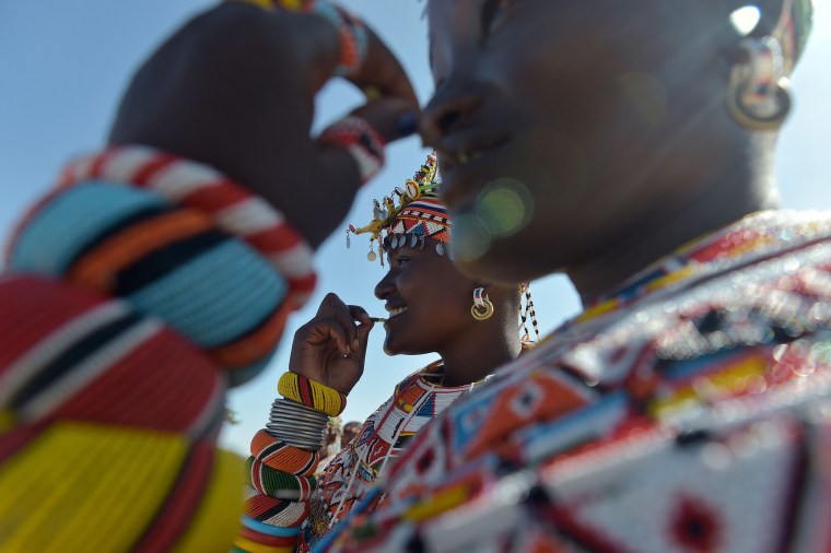 Image: Samburu women of the Lorubai traditional dance group participate in a peace marathon