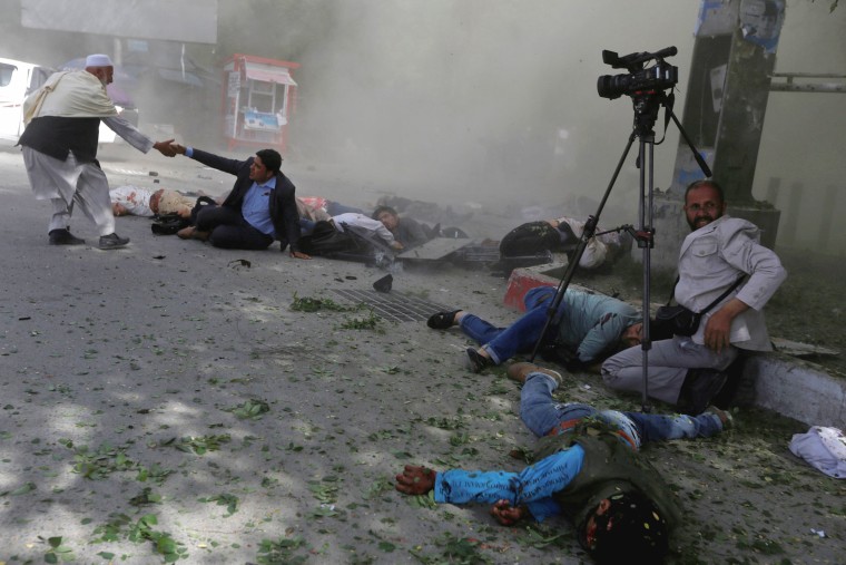 Image: Afghan journalists are impacted after a second blast in Kabul