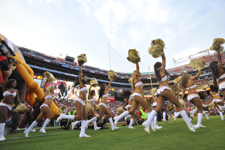 Image: Washington Redskins cheerleaders take the field in 2013