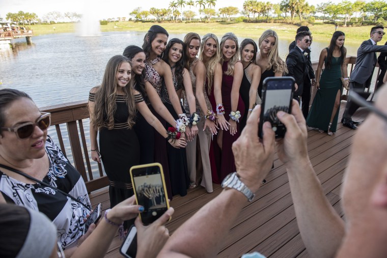 Image: Julia Cordover has her picture taken with classmates