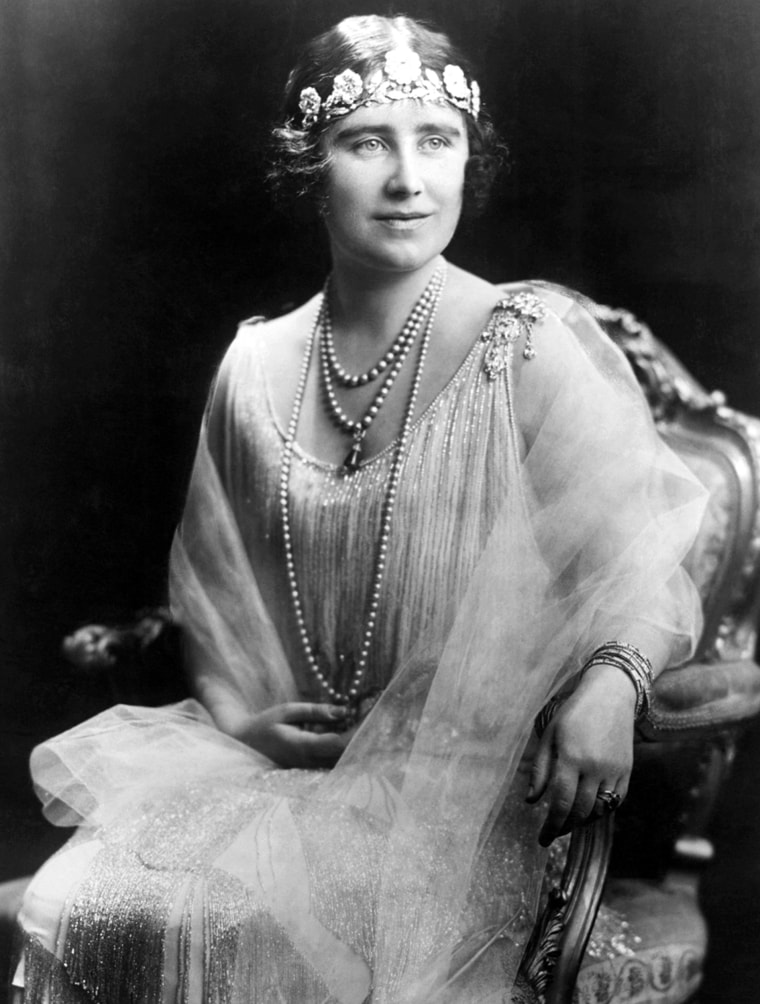 The Queen Mother wore the Strathmore Rose tiara low around forehead in true ‘20s flapper style.