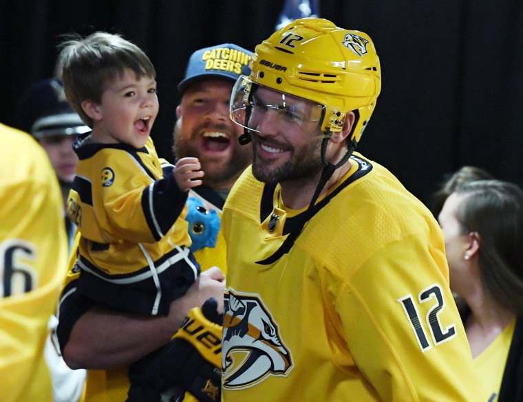 Carrie Underwood's Husband Mike Fisher and Son Isaiah Drop Puck at  Nashville Predators Game Sounds Like Nashville