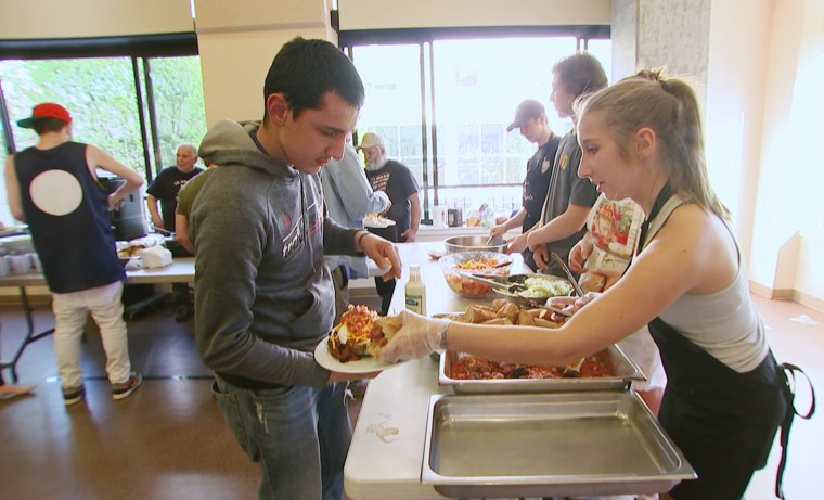 Image: Lincoln High School students prepare meals for homeless youth