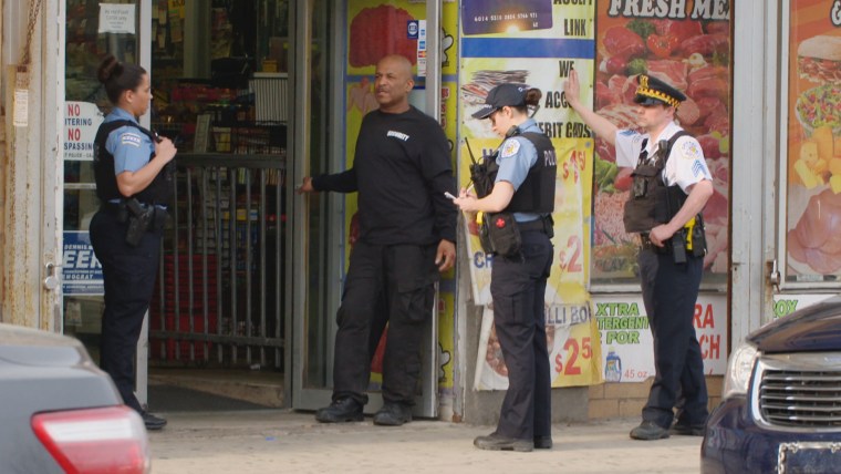 Image: Police respond to a scene at a bodega in Chicago