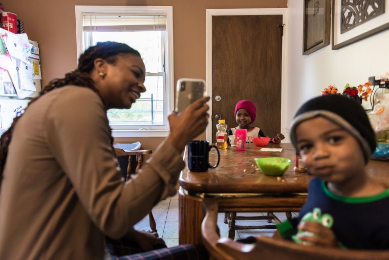 Image: Alia McCants FaceTimes her mother during breakfast at her home in White Plains, New York, May 8, 2018.