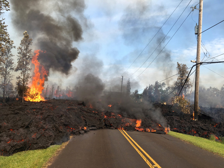 Image: Lava advances along a street near a fissure in Leilani Estates, on Kilauea Volcano's lower East Rift Zone, Hawaii