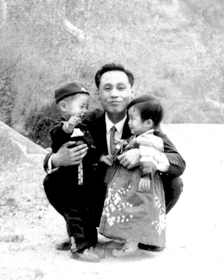 Image:Hwang Won, pictured with his son and niece, was abducted in December 1969.