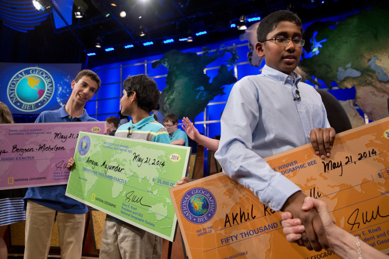 National Geographic Bee 2014 winners hold their awards