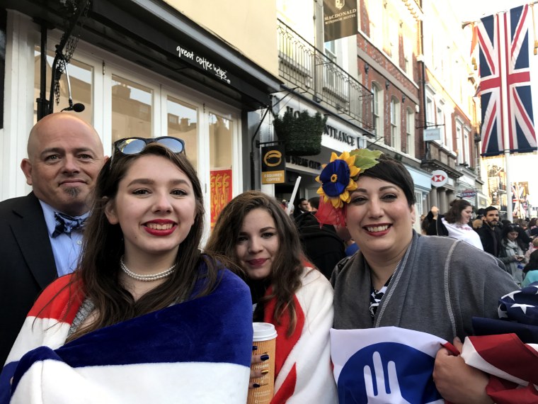 Image: Jonathan Starlin, 42, Kristi Starlin,12, Adrienne Starlin, 38, and Isabelle Starlin, 16, arrived at Heathrow from Wichita, Kansas at 11 p.m.and had secured their spot along Harry &amp; Meghan's carriage procession route by 6 a.m.