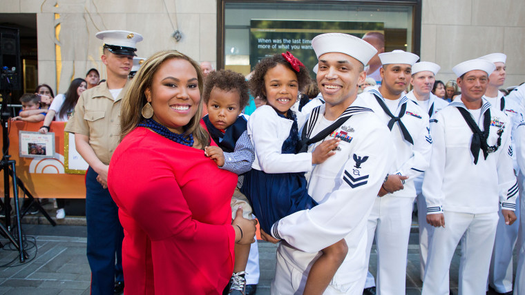 Navy officer Devin Turner reunites with wife Stephanie and their two children on the TODAY plaza
