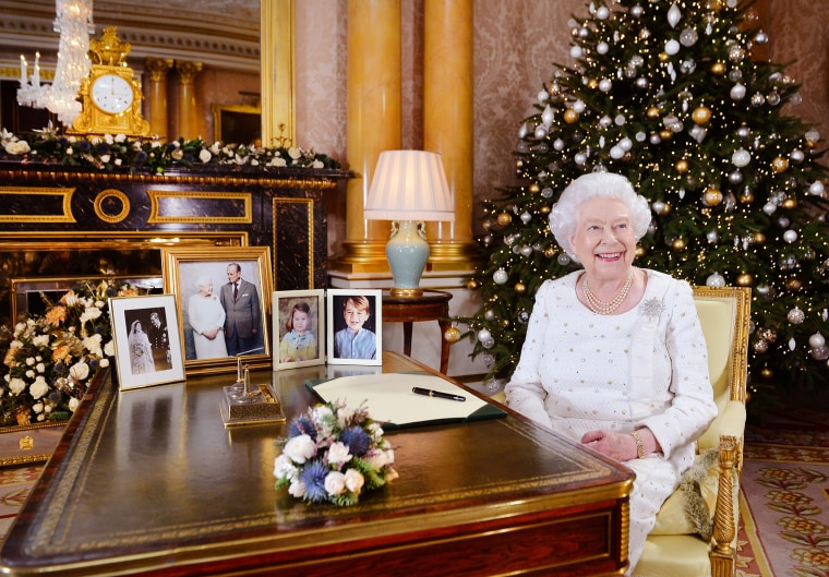 Queen Elizabeth II sits at a desk in the 1844 Room at Buckingham Palace, after recording her Christmas Day broadcast to the Commonwealth at Buckingham Palace, London.