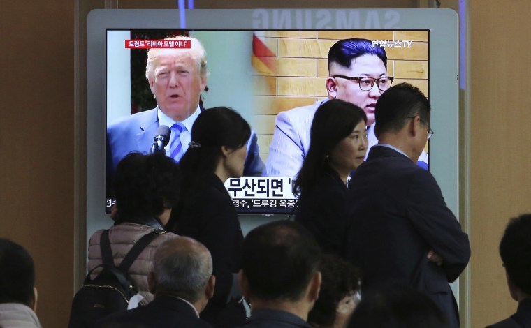 Image: President Donald Trump and North Korean leader Kim Jong Un appear on television