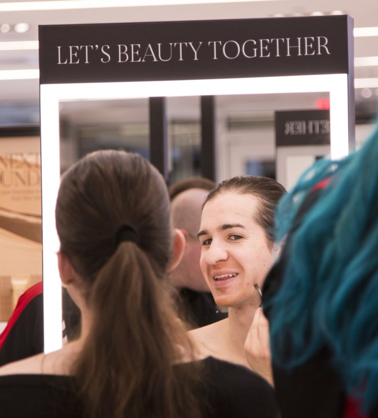 A participant applies makeup in one of Sephora's "Bold Beauty for the Transgender Community" classes.