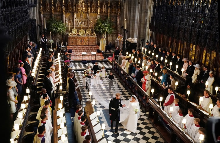 Image: Prince Harry, Duke of Sussex and the Duchess of Sussex leave following their wedding ceremony