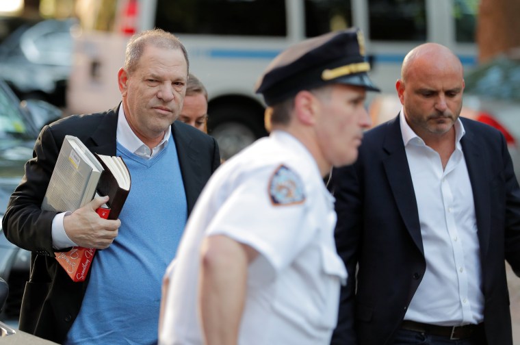 Image: Film producer Harvey Weinstein arrives at the 1st Precinct in Manhattan in New York