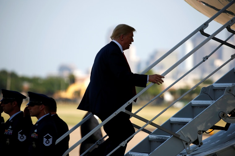 Image: President Donald Trump boards Air Force One as he departs from Dallas, Texas