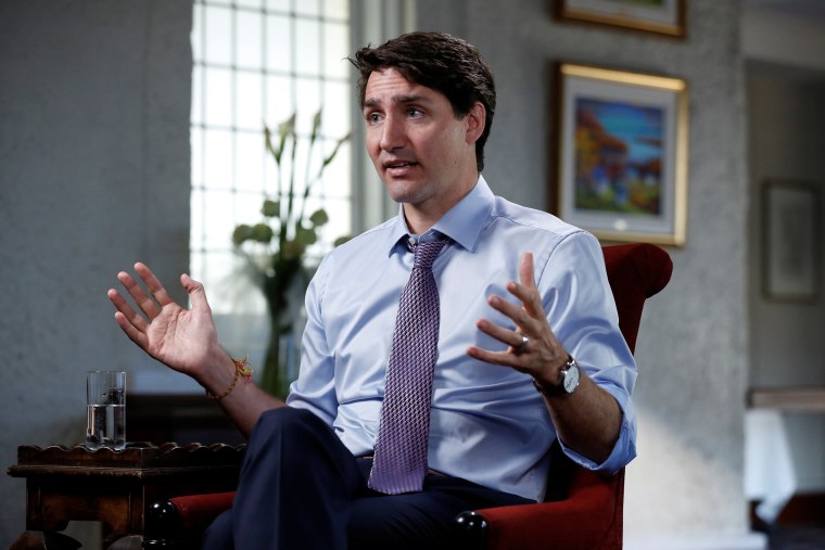 Image: Canada's PM Trudeau speaks during an interview with Reuters in La Malbaie