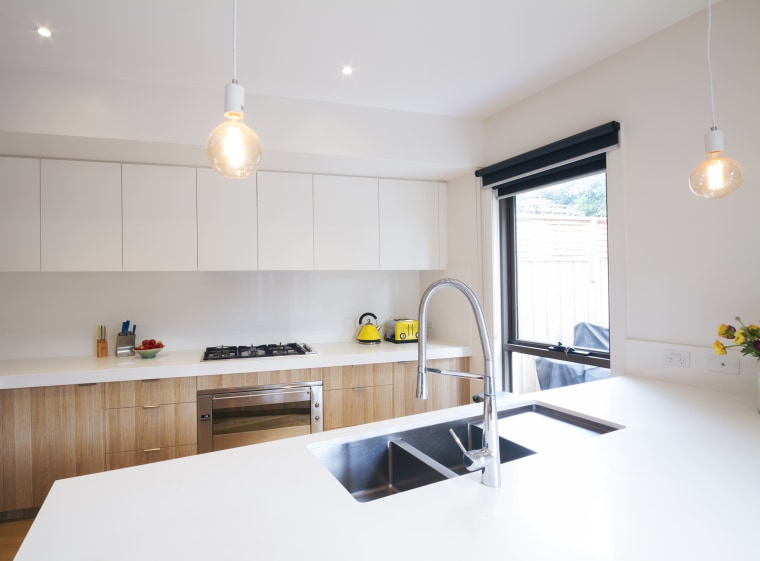 Modern kitchen with pendant lighting and sunken sink