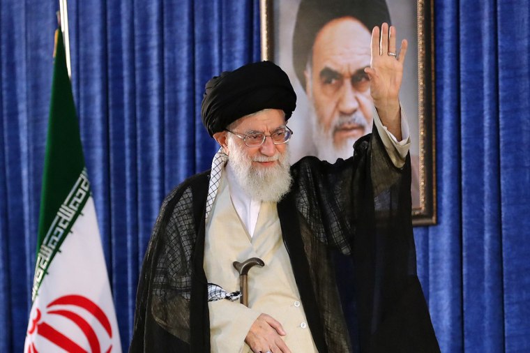 Image: Ayatollah Ali Khamenei greets the crowd