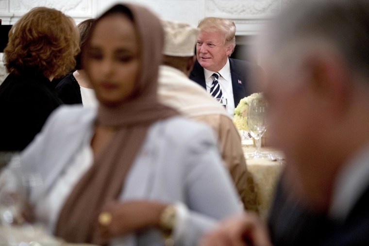 Image: Donald Trump sits down for an iftar dinner
