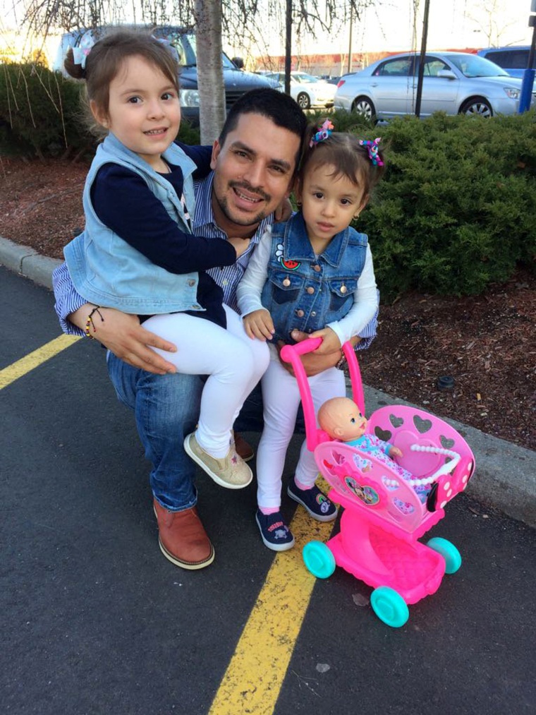 Image: In this undated family photo provided by Sandra Chica, Pablo Villavicencio poses with his two daughters, Luciana, left, and Antonia.