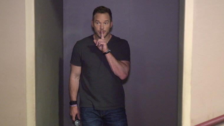 Chris Pratt is about to surprise an audience full of young fans.
