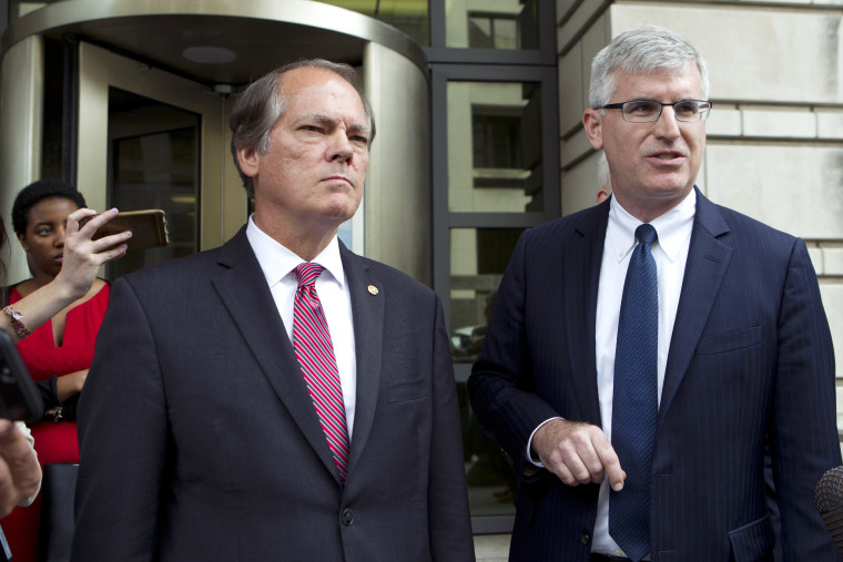 Image: James Wolfe, left, former director of security with the Senate Intelligence Committee accompanied by his attorney Benjamin Klubes