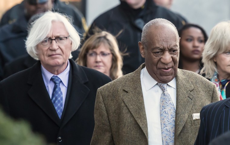 Bill Cosby and his attorney Tom Mesereau leave the Montgomery County Courthouse