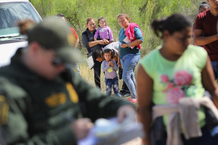 Image: Border Patrol Agents Detain Migrants Near US-Mexico Border