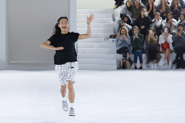 Image: Alexander Wang runs down the runway at the end of his show in New York