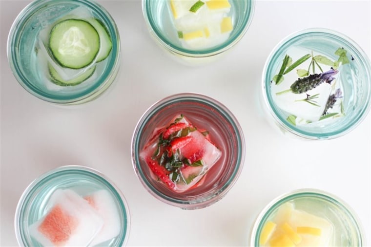 Using fruit, veggies and herbs to make ice cubes will add a pop of color and flavor to a glass of water.