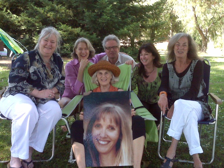 Amber's friends at a celebration of her life in 2011. Nancy Murphy holds the photo of Amber.