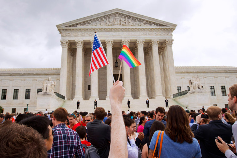 Image: A crowd gathers outside of the Supreme Court in Washington on June 26, 2015