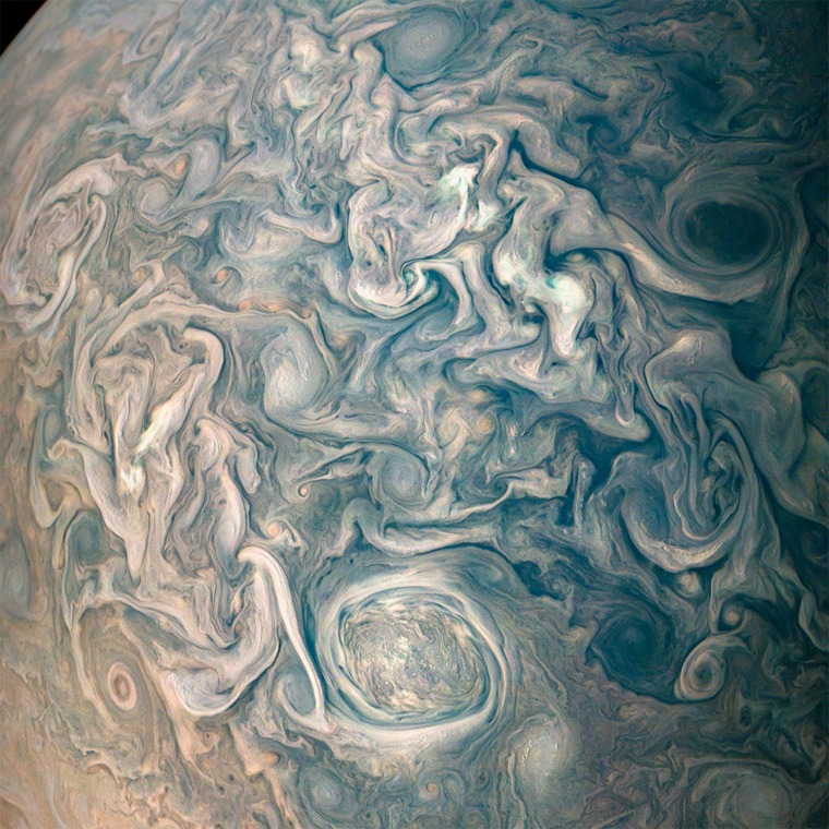 A new photo from the Juno spacecraft offers a mesmerizing look at the swirling clouds that make up Jupiter's atmosphere.