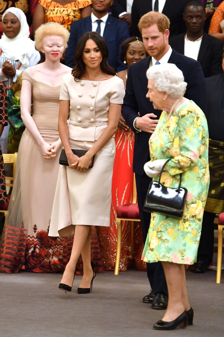 Britain's Queen Elizabeth, Prince Harry and Meghan, Duchess of Sussex