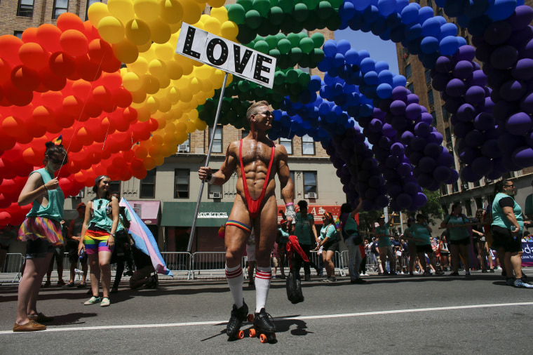 Image: A reveler attends the annual Pride Parade in New York