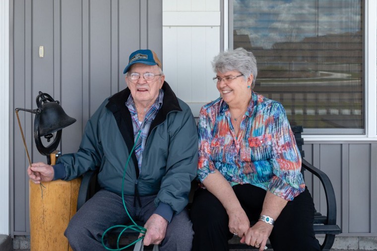 Delmar Scroughams and his wife, Vergie "Verg" Scroughams, at home in Rexburg, Idaho. During a lucid moment in May, Delmar, who has dementia, acknowledged his weapons could prove dangerous.