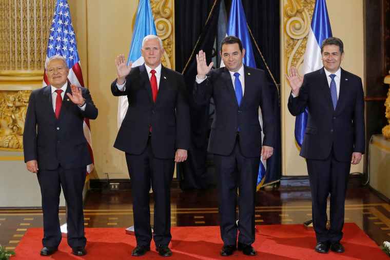Image: El Salvador's President Sanchez Ceren, U.S. Vice President Pence, Guatemala's President Morales and Honduras' President Hernandez wave during a photo opportunity in Guatemala City