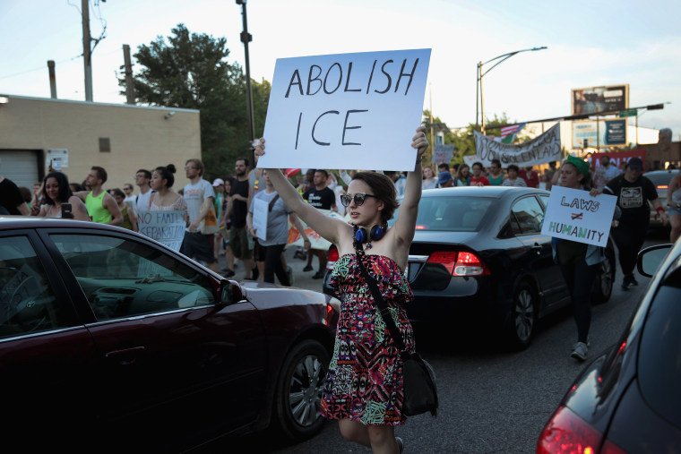 Image: Protestors In Chicago Rally Against Mass Detention Of Undocumented Immigrants