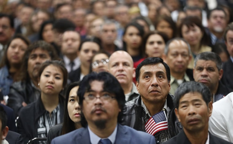 New U.S. citizens attend a naturalization ceremony in Los Angeles