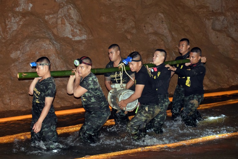 Image: Cave search continues for members of football team missing in northern Thailand