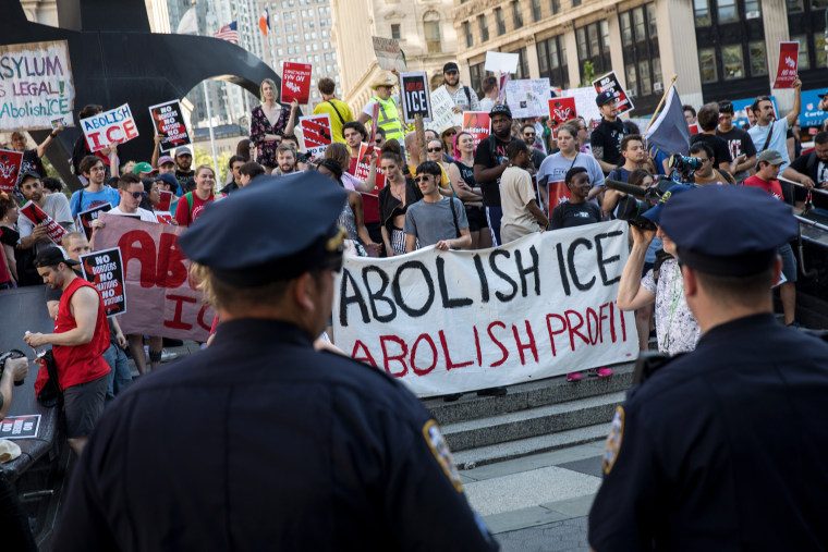 Image: Activists march and rally against Immigration and Customs Enforcement