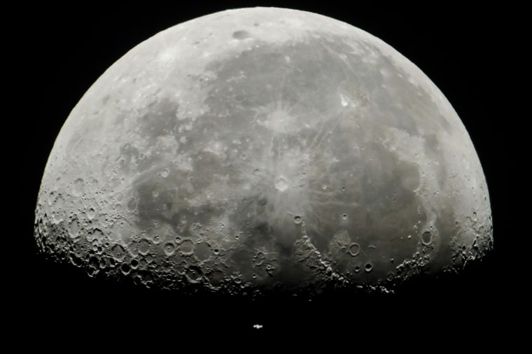 Image: Space Station passes in front of the Moon