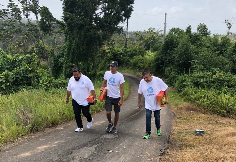 Image: OHorizons' team travels from house to house in Yabucoa, Puerto Rico to distribute solar equipment