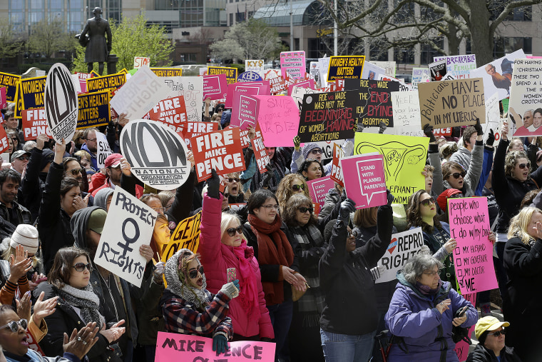 Hundreds of abortion-rights supporters gather at the Indiana Statehouse in Indianapolis on April 9, 2016, to protest an anti-abortion law signed by Gov. Mike Pence.