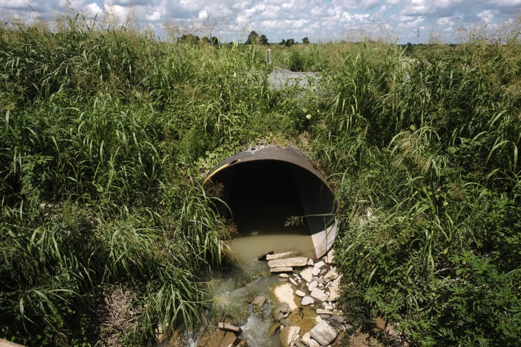 Image: The Washington County road department installed an old rail car as a culvert beneath a newly reconstructed bridge