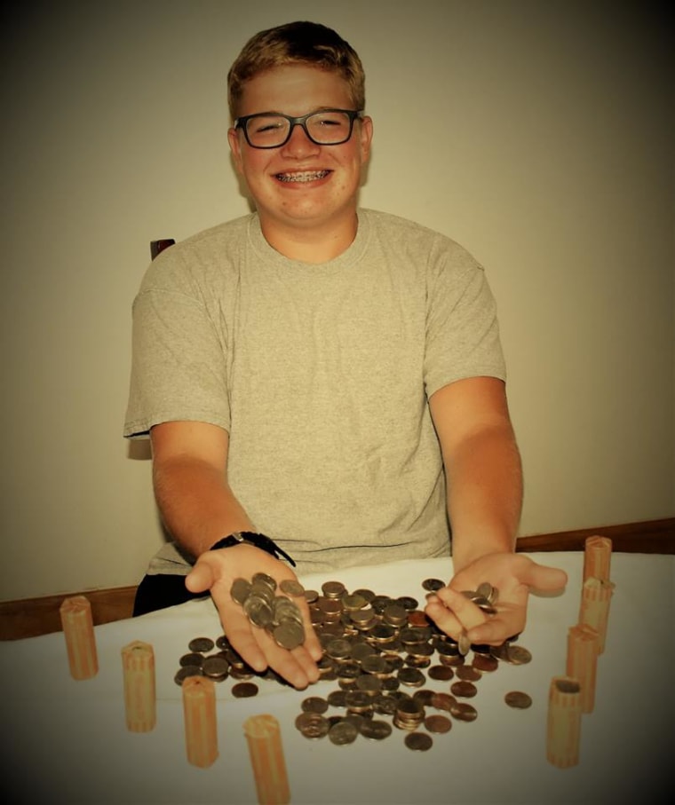 Cohen Naulty with piles of quarters