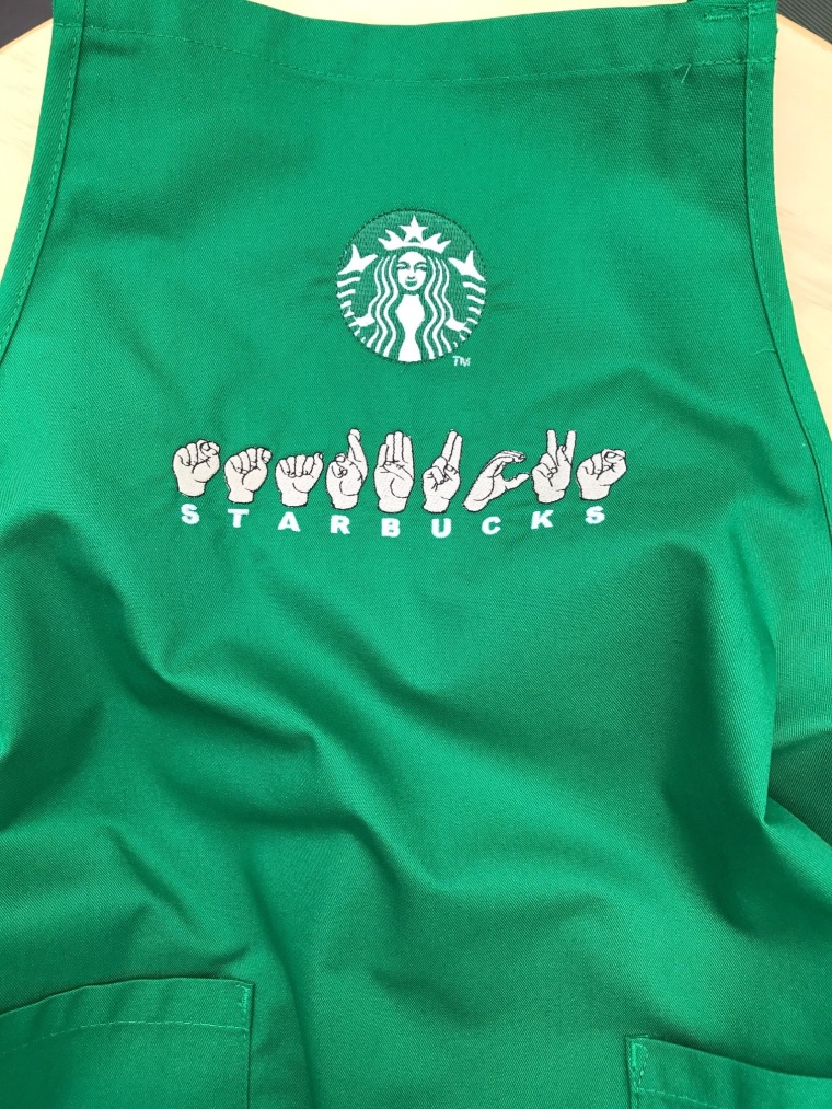 Starbucks signing store apron